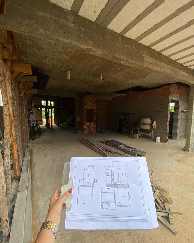 LongPie team reviewing blueprints on site